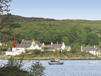 Situated on a peninsular jutting out into Loch Carron, this cottage makes for a perfect Highland getaway | The Holt, Plockton