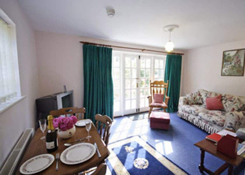 Wisteria Cottage sitting room with dining area | Wisteria Cottage, Aylsham