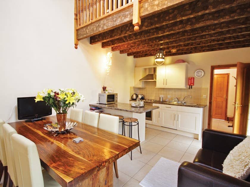 Plum Cottage sitting/dining room with kitchen area | Plum Cottage, Mumby, nr. Anderby Creek