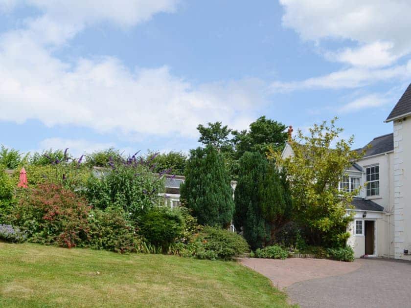 Lush well tended borders give the property spme [rivacy and sec;usion | The Orangery, Bideford