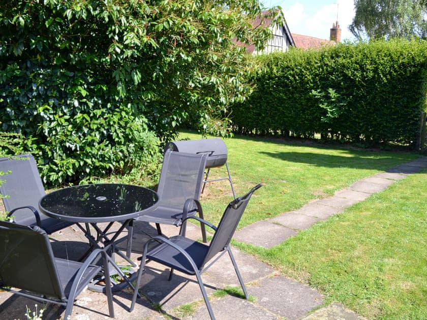 Garden with outdoor furniture and BBQ | The Cottage - Scarning Dale Cottages, Scarning, near Dereham