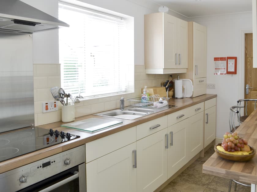 Well-equipped fitted kitchen | Barkers Cottage, Ellington, near Druridge
