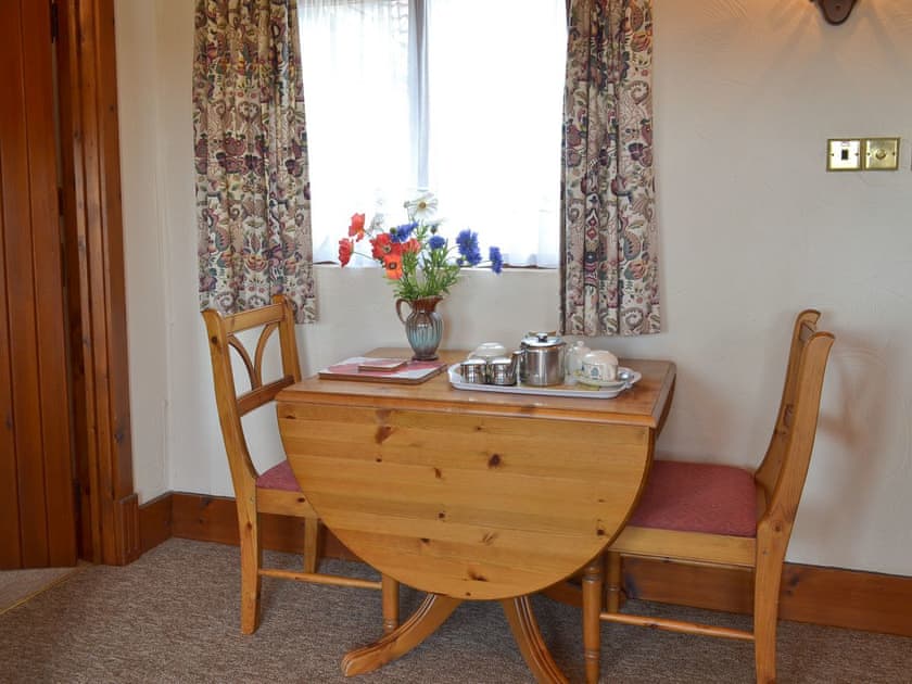 Dining area | Whitwell Farm CottagesBrandy’s, Whitwell Farm, Colyford, near Seaton