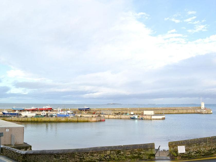 A short stroll brings you to the harbour at Seahouses | The Coracle, Seahouses