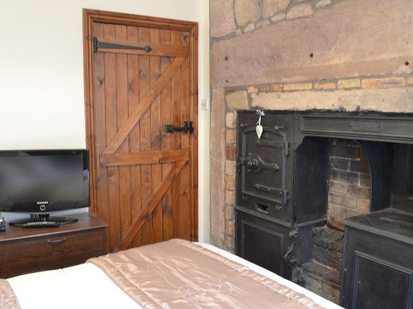 Double bedroom with plenty of character | The Coracle, Seahouses