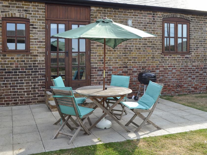Attractive holiday home with patio and enclosed lawned garden | The Haybarn - Decoy Farm Holiday Cottages, High Halstow, near Rochester