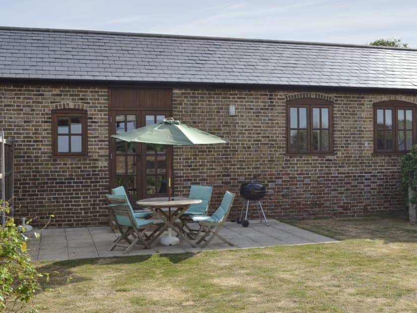 Patio with outdoor furniture | The Haybarn - Decoy Farm Holiday Cottages, High Halstow, near Rochester