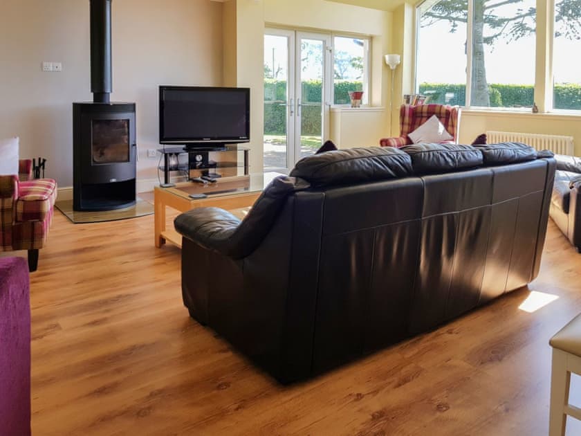 Well renovated spacious living room with wood burner | Blossom Cottage - Caerlaverock Cottages, Caerlaverock near Dumfries