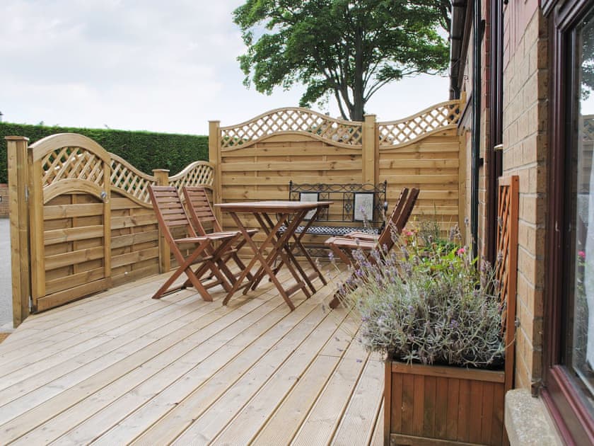 Sitting-out-area | Eldin Hall Cottage Three, Cayton Bay, nr. Scarborough