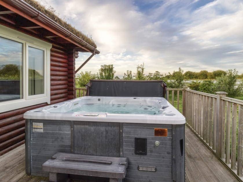 Luxurious hot tub on decked terrace | Mallard Lodge - Mackinder Farms, Brayton, Selby