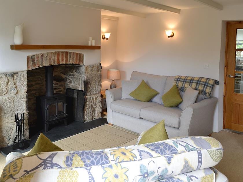 Lounge with wood burning stove | Penney Cottage , Biscovey, near St Austell