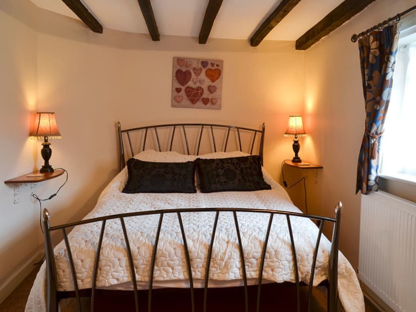 Double bedroom with beams | Childe of Hale Cottage, Hale Village