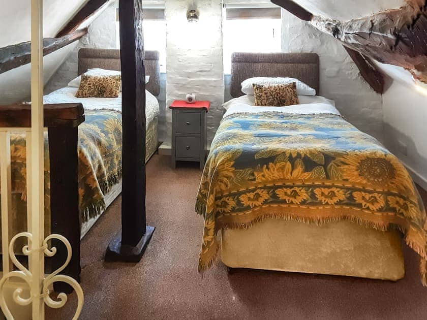 Twin bedroom with beams | Childe of Hale Cottage, Hale Village