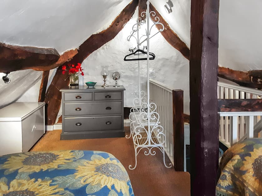 Twin bedroom with beams | Childe of Hale Cottage, Hale Village