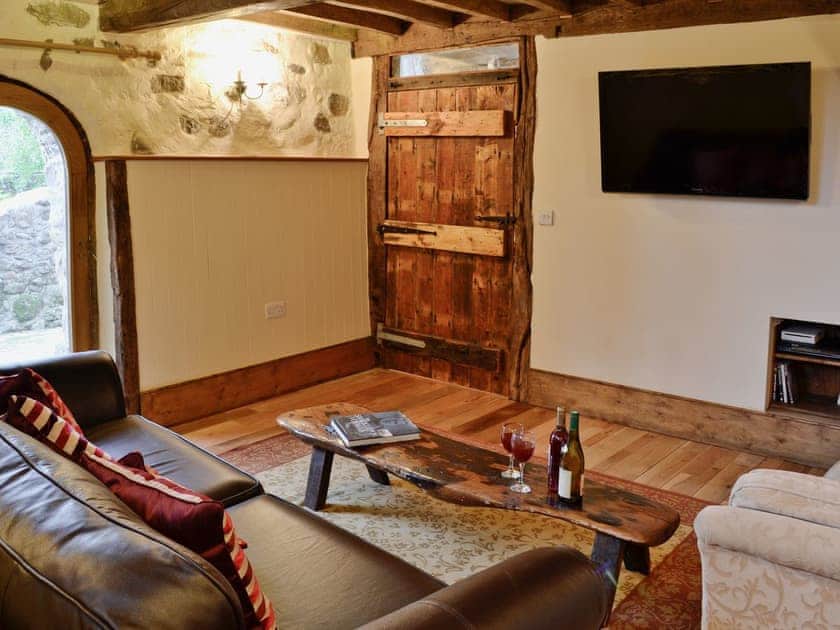 living room with hand carved features  | The Byre, Penycae, near Wrexham