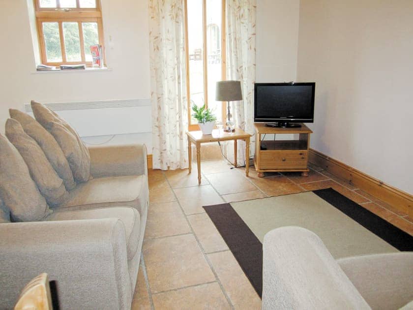 Living room | Filey Holiday Cottages - Hutton Cottage, Muston, Filey