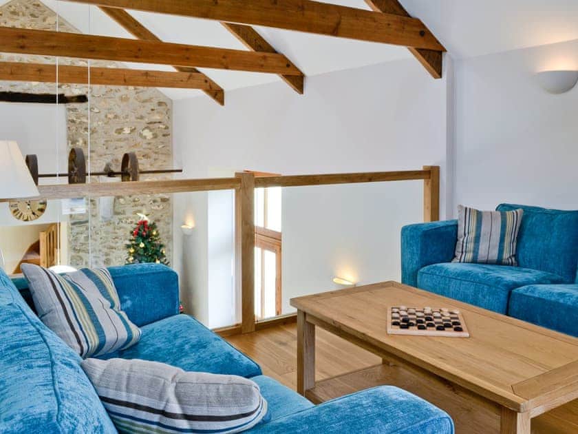 Mezzanine sitting area perfect for relaxing | Felin Hedd - Red Kite Holidays, Tregaron, near Aberystwyth