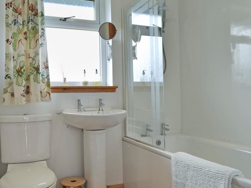 Bathroom with shower over bath  | Riverview Cottage, Acharacle