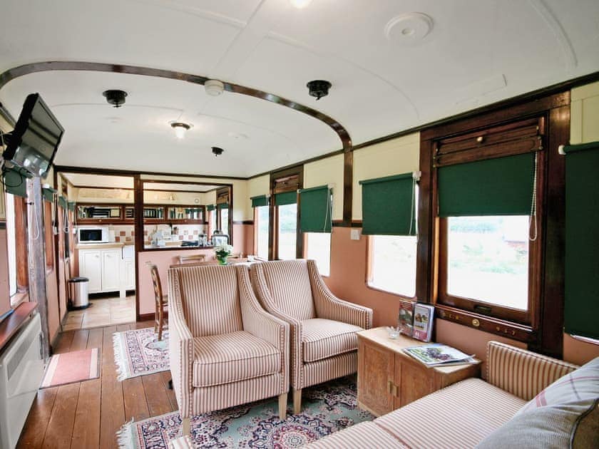 Living room/dining room | Brockford Railway Sidings - Railway Carriage Two, Brockford, nr. Stowmarket