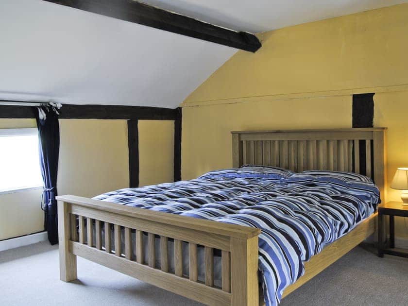 Double bedroom | Hirros Hall Longhouse, Llanerfyl, nr. Welshpool