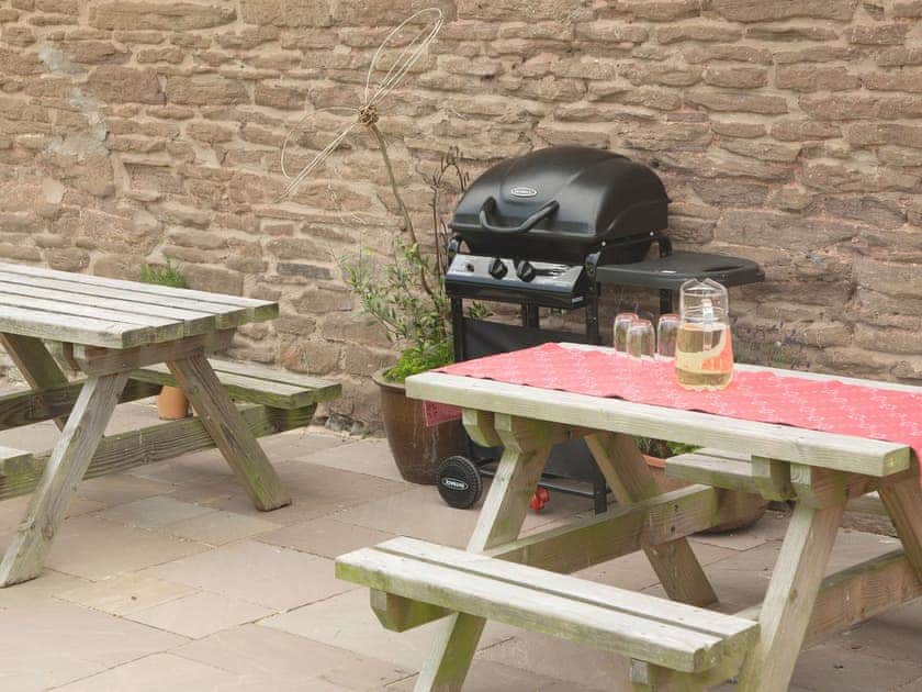 Sitting-out-area | Ashton Court Holiday Cottages - West Granary, Ashton, nr. Leominster