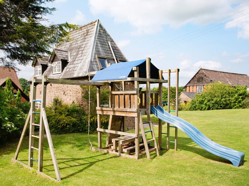 Children’s play area | Ashton Court Holiday Cottages - East Granary, Ashton, nr. Leominster