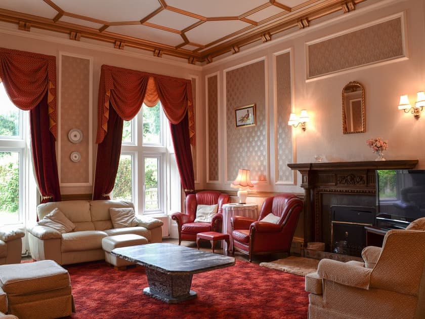 Impressive living room with many period features | Llys Y Craig, Near Penraeth