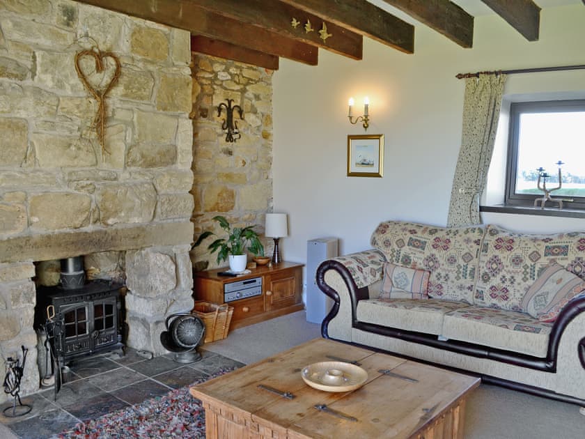 Spacious living room with  original features | Sandsedge Cottage, Druridge Bay