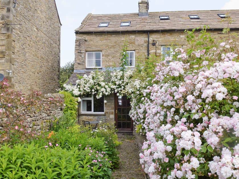 Attractive stone cottage with mature front garden | Ellerlands, Carperby near Leyburn
