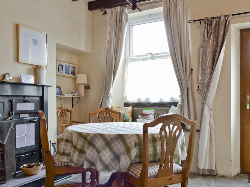Spacious dining area with exposed wood beamed ceiling | Cattlemarket Cottage, Hawes