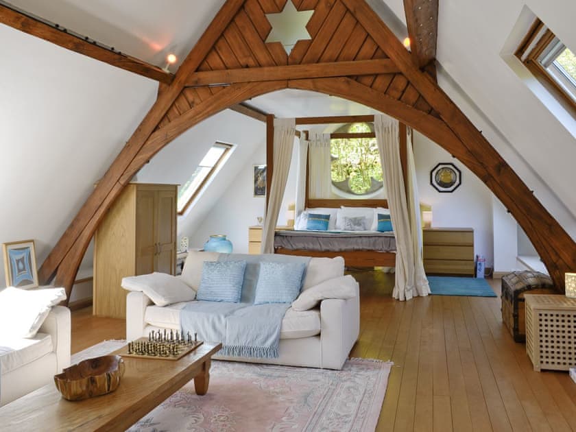Spacious first floor lounge with open aspect to four poster bed | St John The Baptist Mission Church, Capel Curig