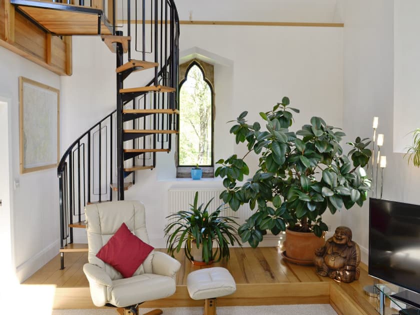 Spiral staircase connects the ground floor and upper level | St John The Baptist Mission Church, Capel Curig