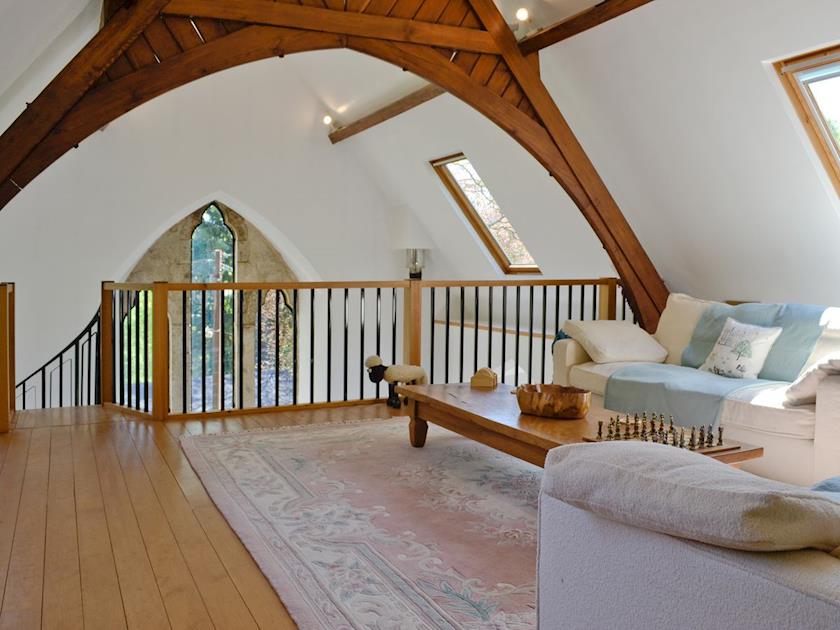 Large first floor lounge with mezzanine balcony | St John The Baptist Mission Church, Capel Curig
