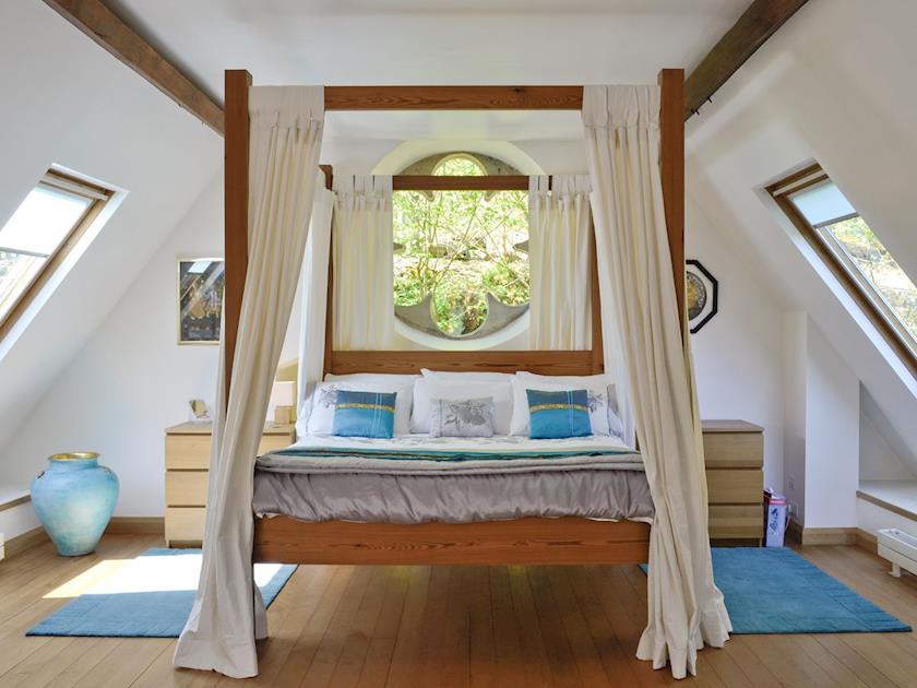 Characterful four poster bed | St John The Baptist Mission Church, Capel Curig