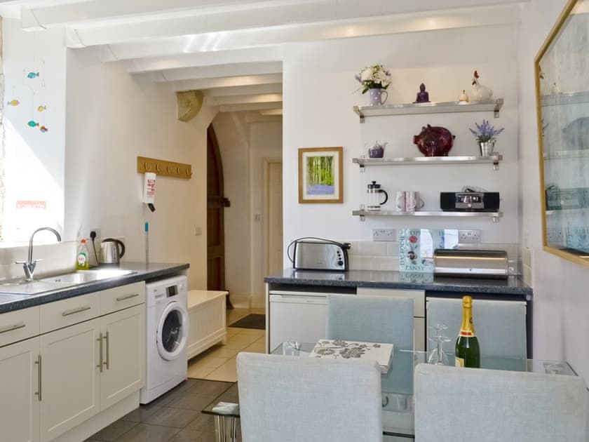 Well-appointed fitted kitchen with dining area | St John The Baptist Mission Church, Capel Curig