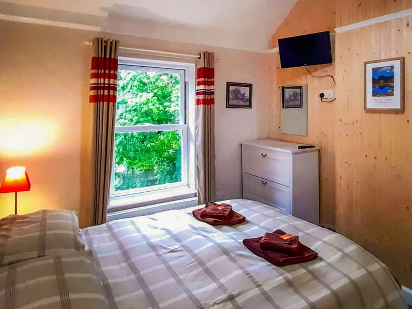 Bedroom made up as a twin | Riverbank Cottage, Keswick