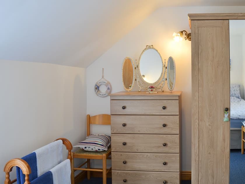 Delightful twin bedroom with complementary furniture | Dragonfly Cottage - West End Farm Cottages, Brompton by Sawdon