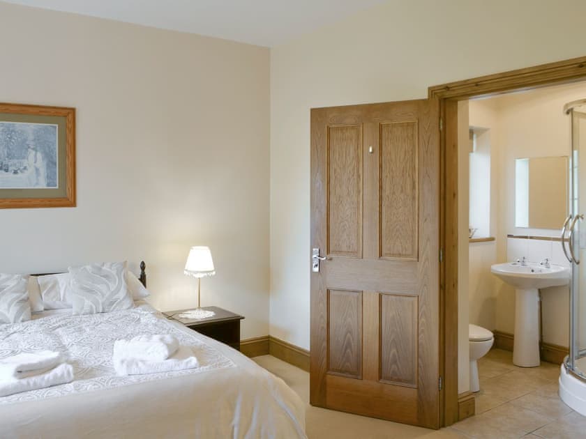 Comfortable double bedroom with en-suite shower room | Alby Bungalow, Cumwhinton, Carlisle