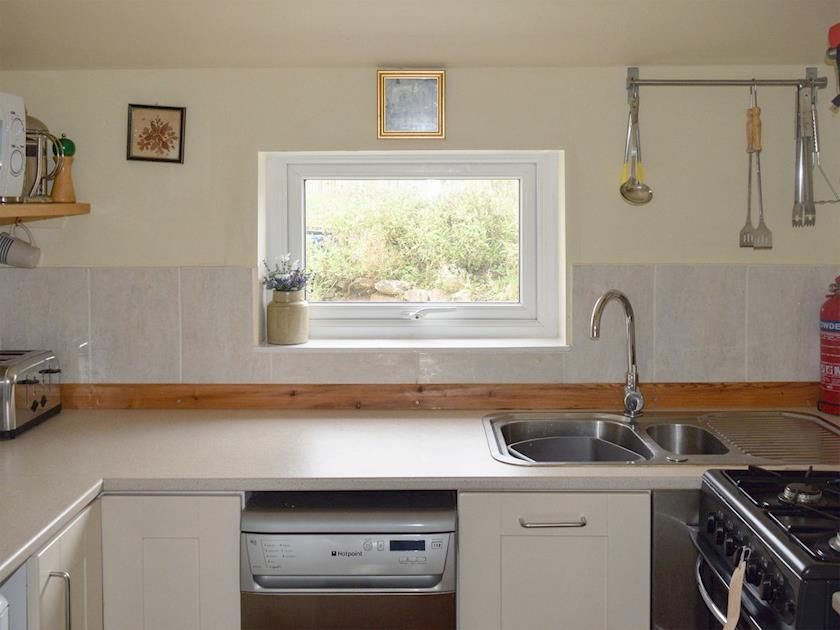 Galley style kitchen | Cross Garden Cottage, Salcombe