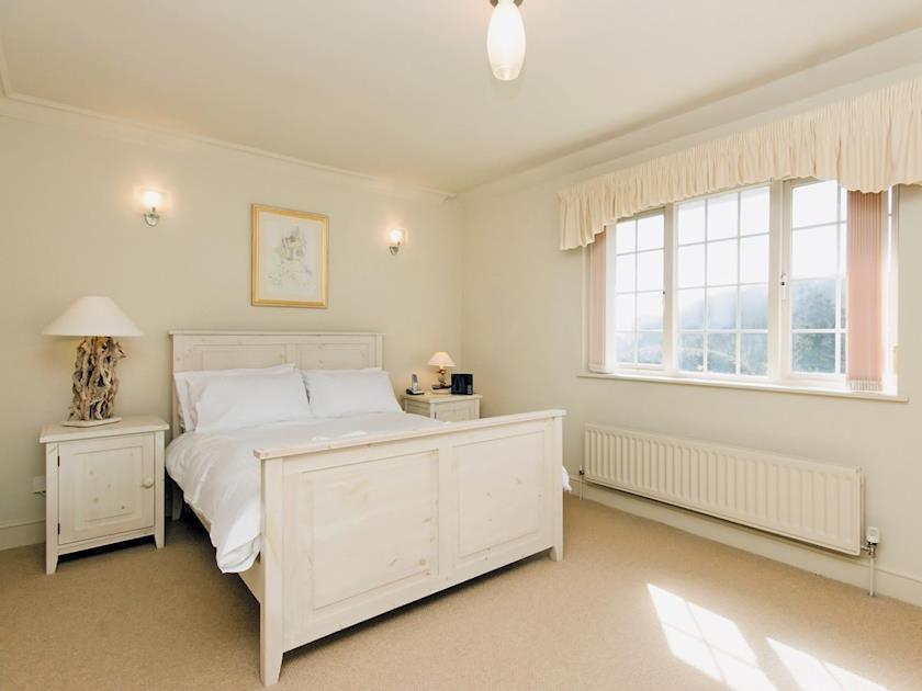 Comfortable double bedroom with door to balcony | St Elmo Court 7, Salcombe