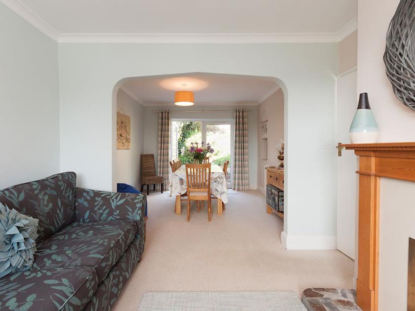 Living area with archway through to the dining room | End House, Salcombe