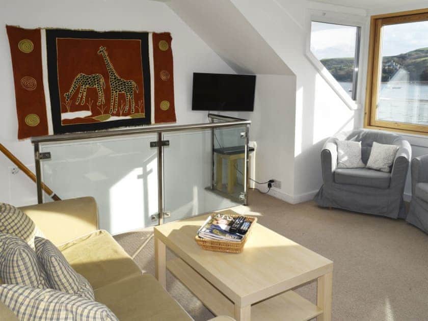 Feature vaulted sitting room with large picture window | Quays Cottage, Salcombe