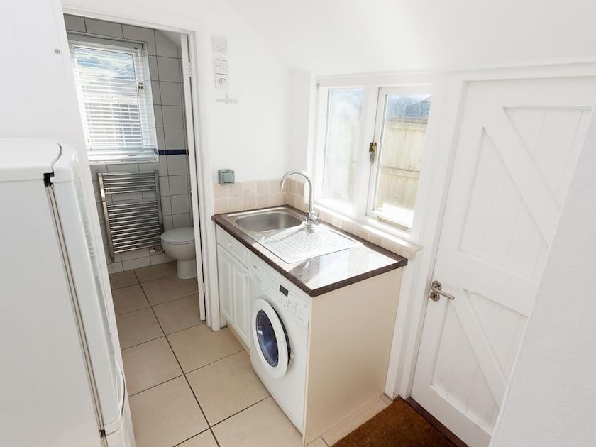 Useful utility room | Quays Cottage, Salcombe