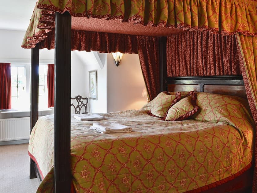 Four Poster bedroom | The Court, Wern-y-Wylan, Anglesey