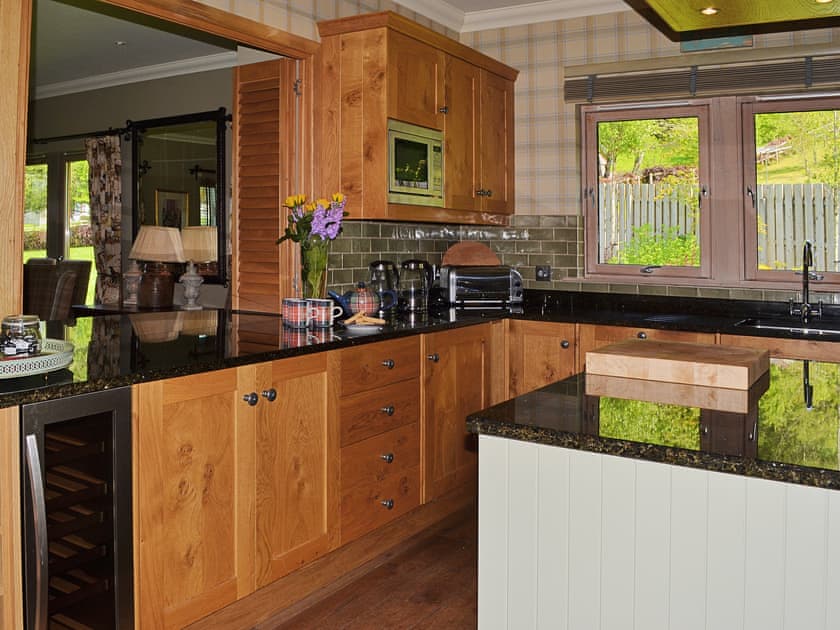 Well-equipped kitchen with wooden floor | River Lodge - Ness Castle Estate, Inverness
