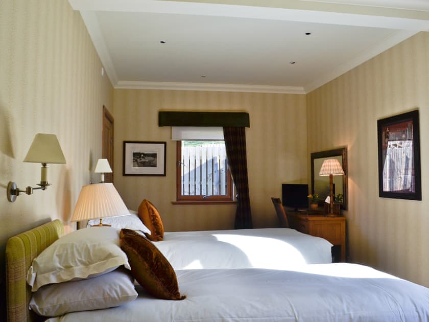 Tastefully furnished twin bedroom | River Lodge - Ness Castle Estate, Inverness