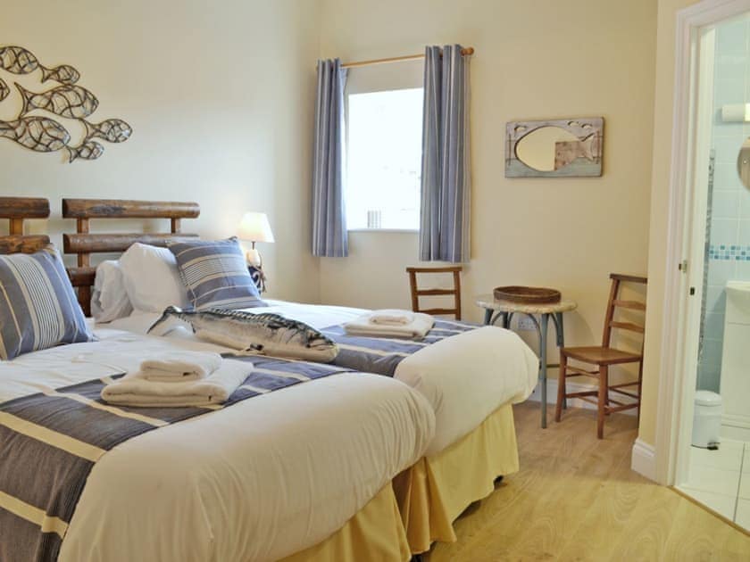 Twin bedroom | The Old Cow Shed, Kidwelly