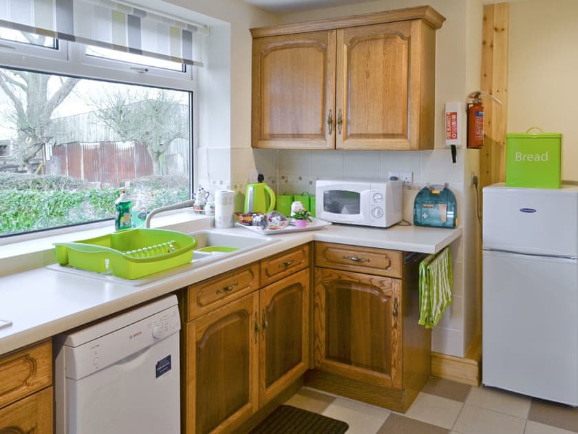 Well-equipped fitted kitchen | Orchard Cottage, Old Liverton Village, near Whitby