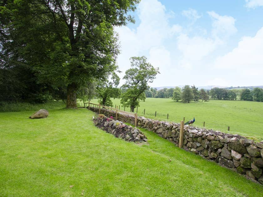 The enclosed garden is superb for long sunny days | Tullibole Castle Longhouse, Crook of Devon