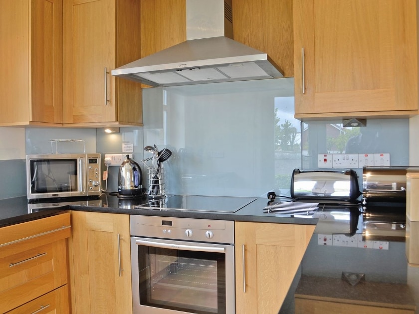 Typical Open plan living/dining/kitchen | Links Apartments - Links Apartment 1, Brora